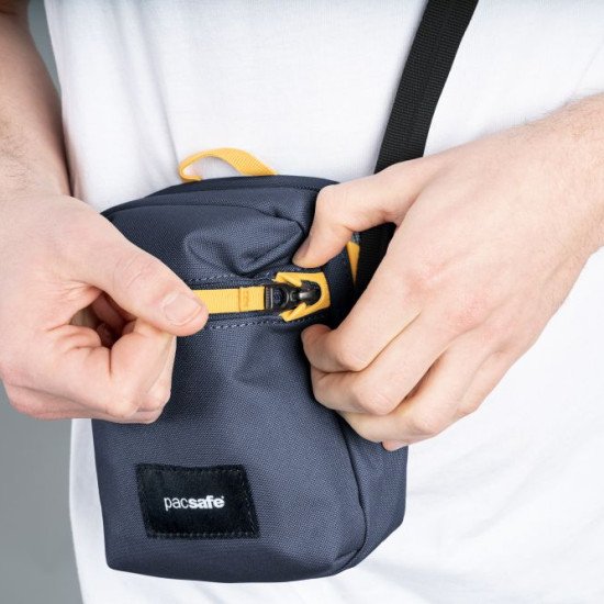 Сумка через плече антизлодій Pacsafe GO Micro Crossbody, колір темно-синій/жовтий - 35130651