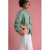 Сумка через плече антизлодій Pacsafe GO Crossbody, колір рожевий - 35125340